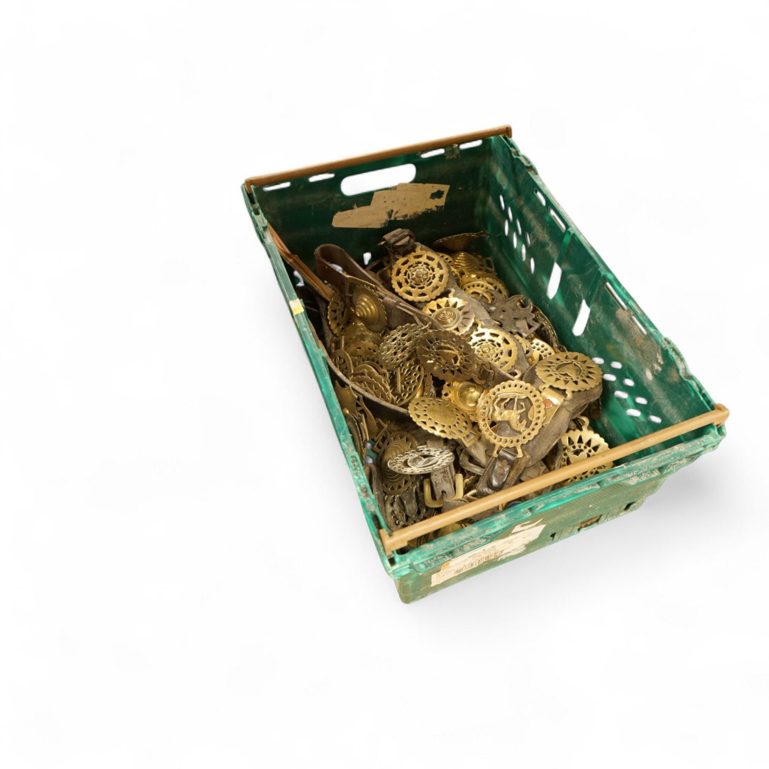 A collection of various horse brasses